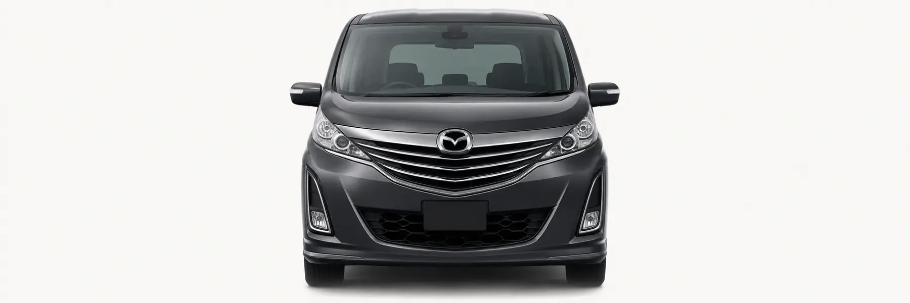 Front view of a graphite Mazda Biante fading into the page background