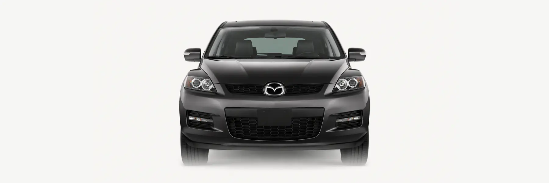 Front view of a graphite Mazda CX-7 ER fading into the page background
