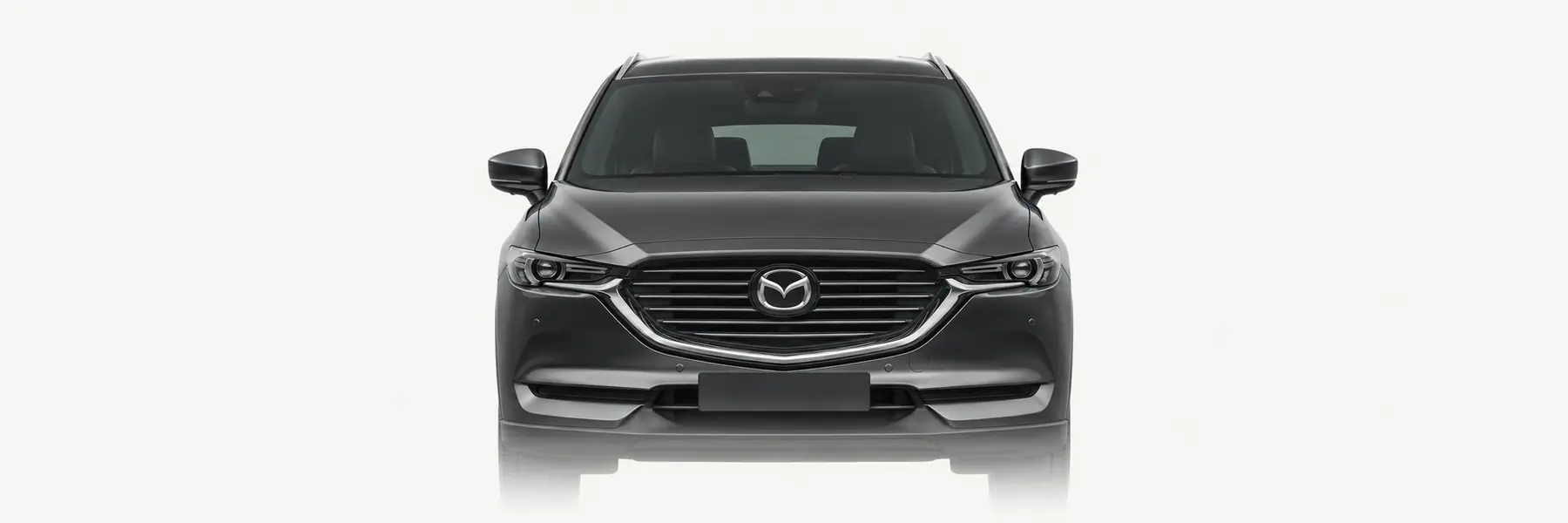 Front view of a graphite Mazda CX-8 KG fading into the page background