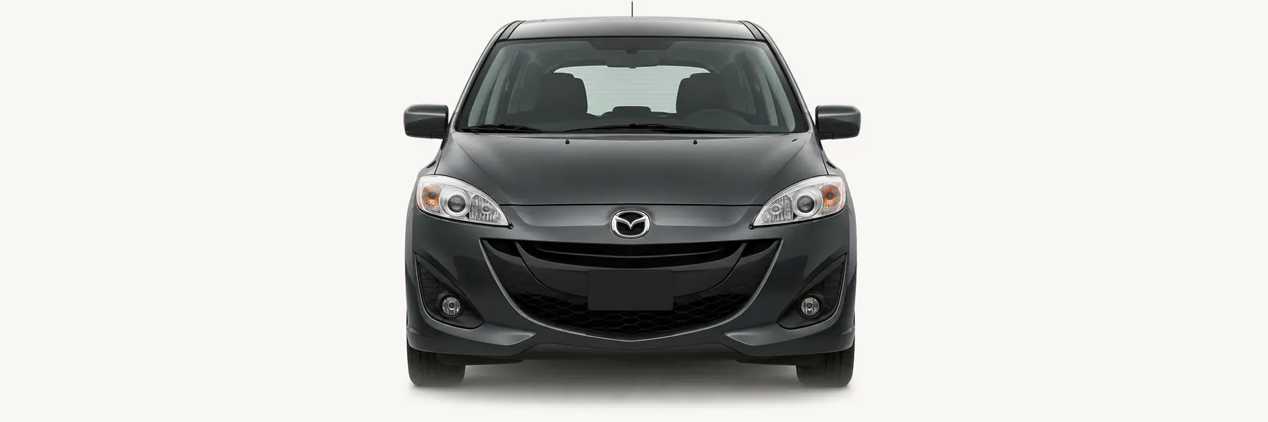 Front view of a graphite Mazda5 and Premacy CW fading into the page background